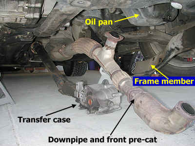 Transfer case and downpipe on shop floor